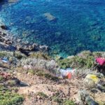 Alghero Calabona - Canal de l'home mort - Intervento acrobatico di pulizia sulla scogliera
